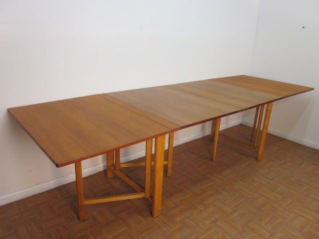 Bruno Mathsson Maria table with gate legs.  Very functional table which can be used in many ways.  Top is teak with maple legs.  <br />
Fully extended, measures 110W x 35.5