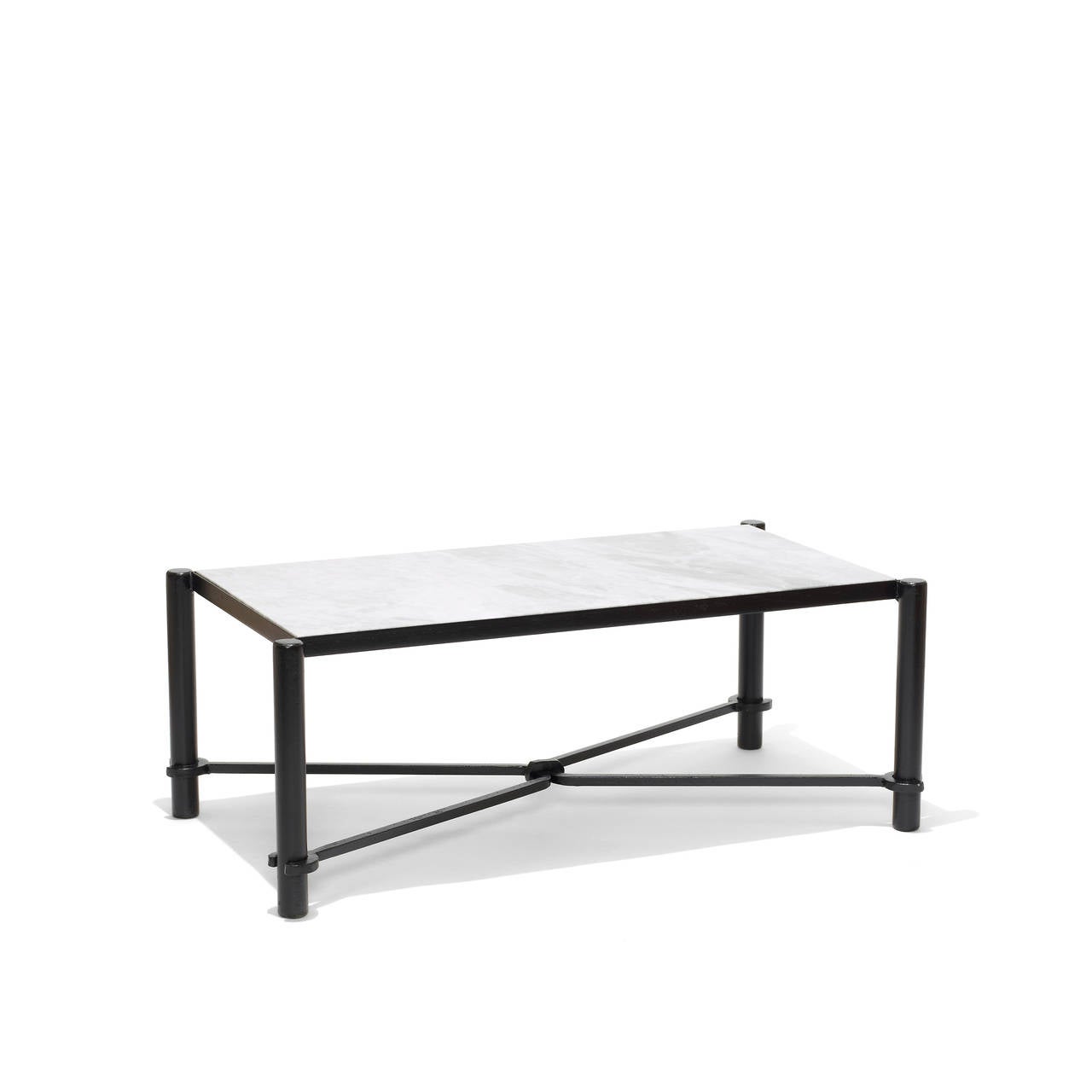 Coffee table with articulated legs and decorative stretcher with horse-tack-like feel by Jacques Adnet (1901-1984), in black-painted iron with marble top, France, mid-20th century.

16.5 in. (42 cm) H x 43 in. (109 cm) L x 23 in. (58 cm) W; table
