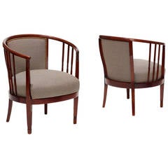 Swedish pair of Arts and Crafts armchairs in beech with carved details