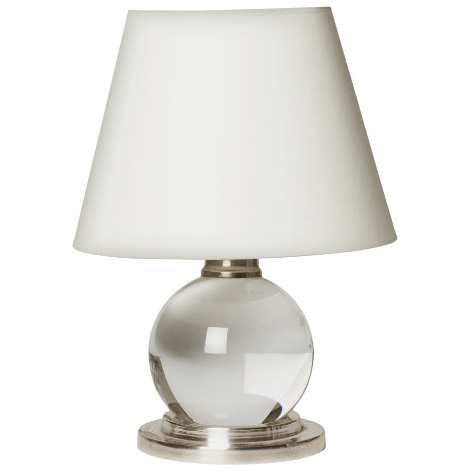 Pair of table lamps with adjustable crystal spheres by Jacques Adnet