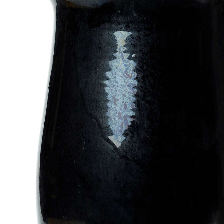 Large hand-thrown urn with moody black glaze with a subtle nacreous quality, by the Kähler pottery, Denmark, 1920s