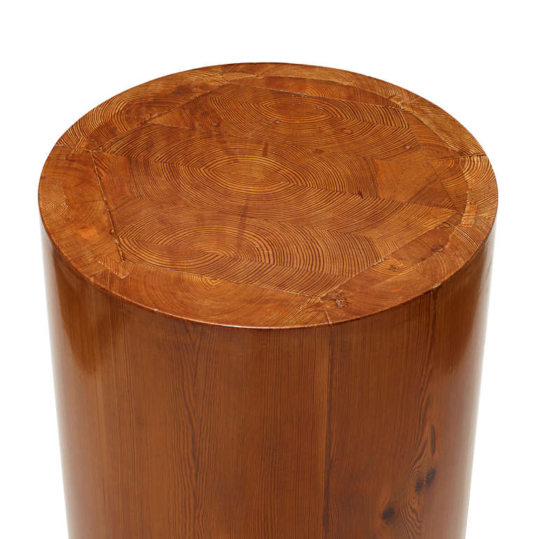 Modern in its simplicity, this Swedish pedestal distils the neoclassical spirit into the most basic elements. The grain of the pine has the figural importance that marble would evoke. Particularly handsome is the on-end grain at the top of the