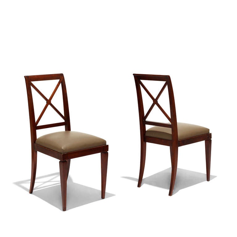 French architect Jacques Adnet (1900-1984) worked for Maurice Dufrêne before establishing himself as a successful decorator, operating in an elegant but logic-driven style for Parisian society.

With this set of side / dining chairs Adnet