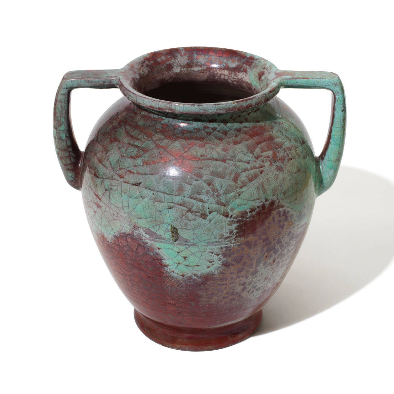 Exceptional monumental urn with handles in the Jugend style by Kähler, in stoneware with celadon and red luster glazes, Denmark, 1900s-1910s. Incised “HAK” mark underside. The red luster glaze used on this piece was a Kähler trademark when it