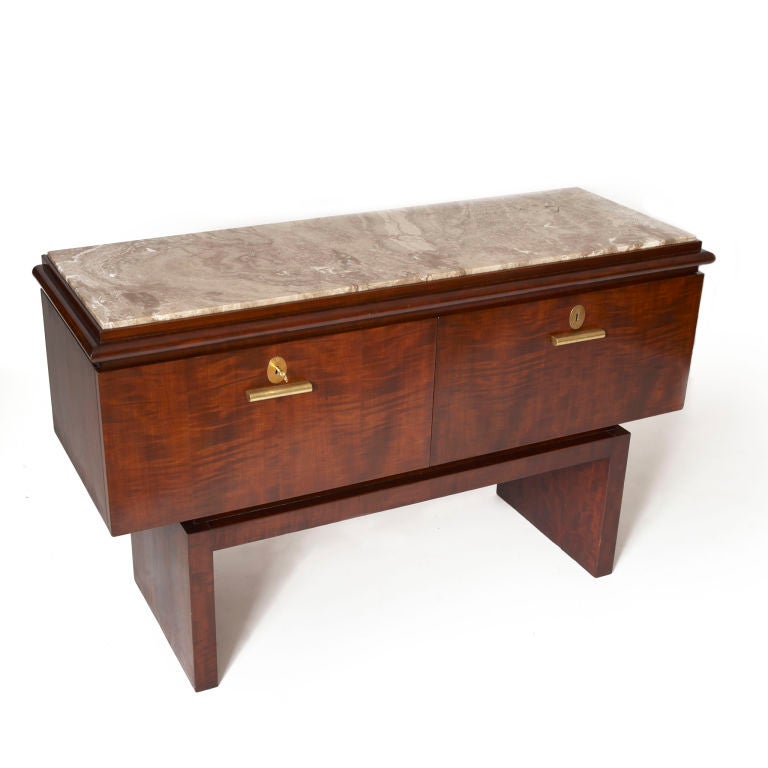 Cabinet in flamed birch with brass handles and original Napoleon marble top. Designed by Professor Bruno Paul (1874-1968) and executed Deutsche Werkstätten of Dresden-Hellerau, Germany.