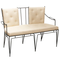 Wrought iron settee and chairs by Marc du Plantier