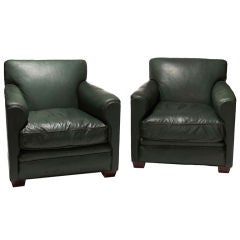 Pair club chairs in original green leather by Jean-Michel Frank