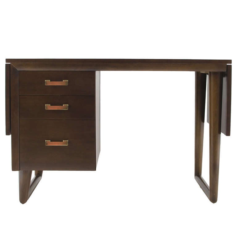 Rarely seen model #5111 double-wing desk designed by T.H. Robsjohn Gibbings for Widdicomb. Dark brown mahogany with brass pulls. Stunning design. Length with both wings 72