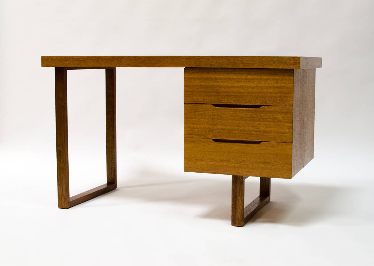 Rare and important mahogany desk designed by Luther Conover, circa 1947 Sausalito, CA. Stunning architectural design with beautiful details. Desk is fully signed with designers stamp. Important example of post-war California design.