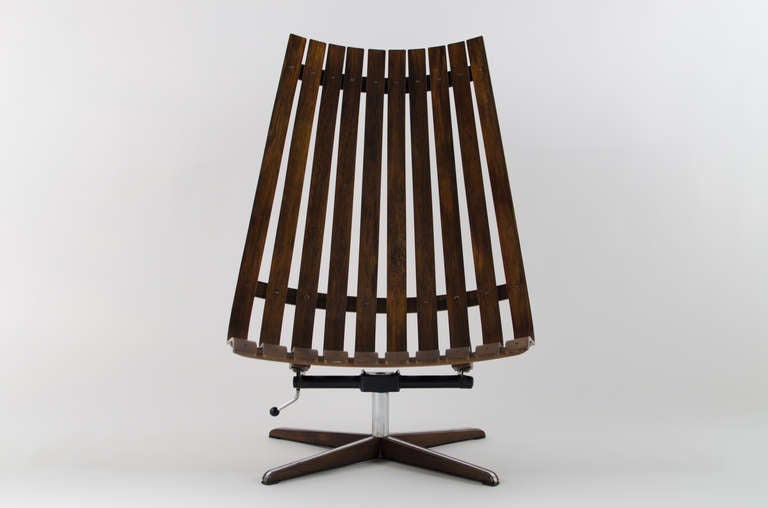 Rare Brazilian rosewood slat lounge chair  designed by Hans Brattrud for Hove Mobler c.1960's. This is an incredibly comfortable lounge chair with an adjustable recline and full swivel. Icelandic sheepskin is available at an additional cost.