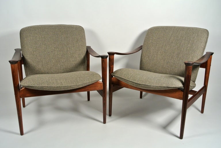 Rare Fredrik Kayser Model 711 Lounge Chairs, for Vatne Lenestolfabrikk circa 1960's. Beautifully sculptural solid rosewood frames with brass hardware. Stunning chairs and extremely comfortable.