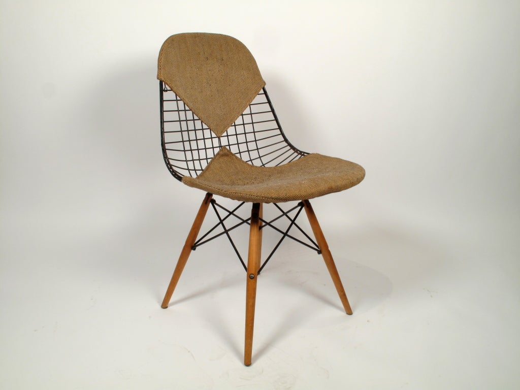 Charles Eames 'DKW-2' Wire Bikini Chair for Herman Miller circa 1952. This rare version rests on a wood dowel base.