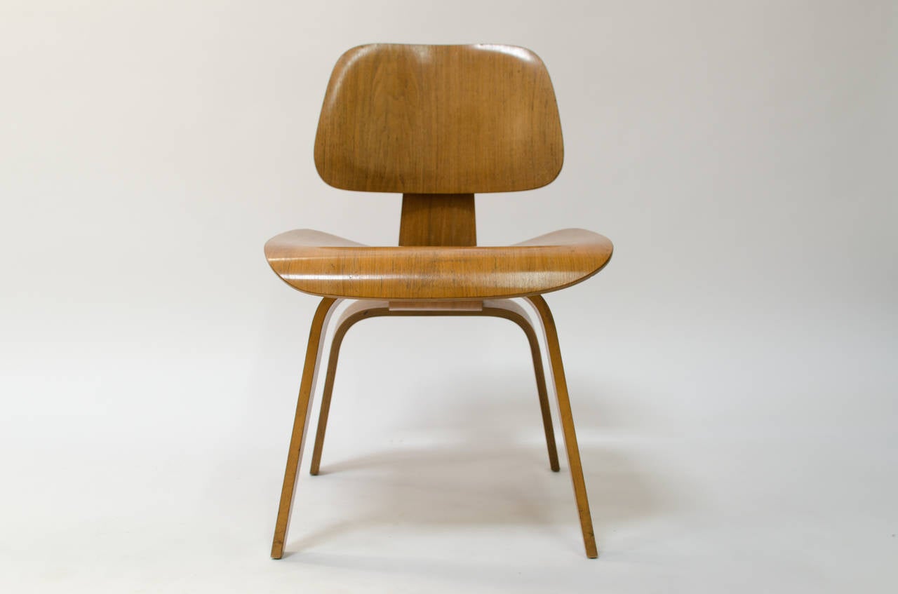Iconic molded plywood side desk/dining chair designed by Charles & Ray Eames for Herman Miller, c.1950's.