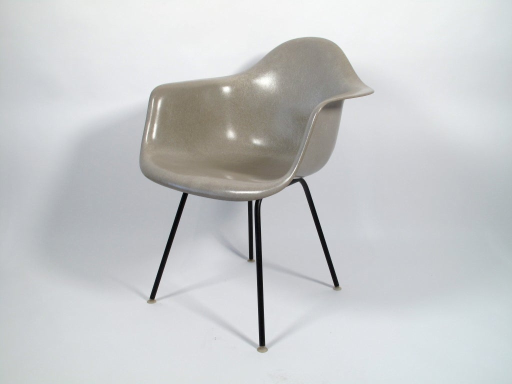Rare greige colored fiberglass armshell designed by Charles & Ray Eames.
