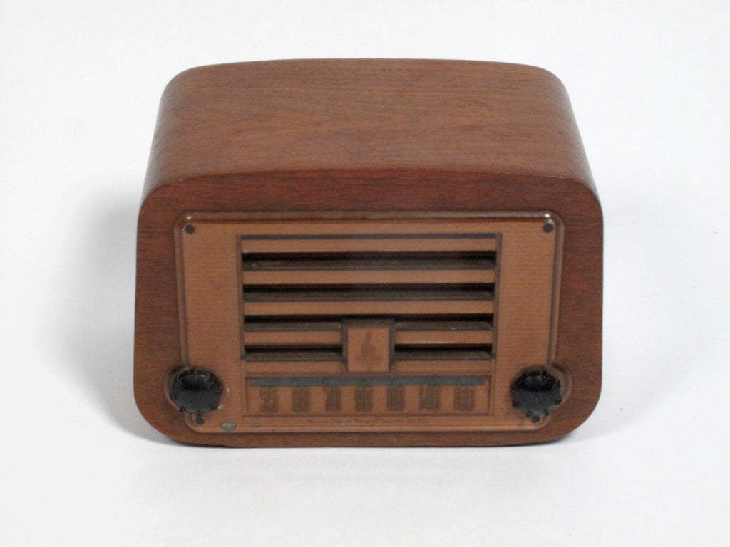 Very early and rare molded plywood enclosed tube radio designed by Charles and Ray Eames for Emerson.