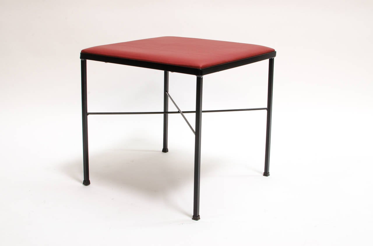 A wonderful X-Base stool designed by D.R. Bates and Jackson Gregory Jr. for Vista of California, in fine restored condition. Steel frame with correct black powder-coat. Reupholstered with new Swedish red leather by Elmo. Perfect condition. An