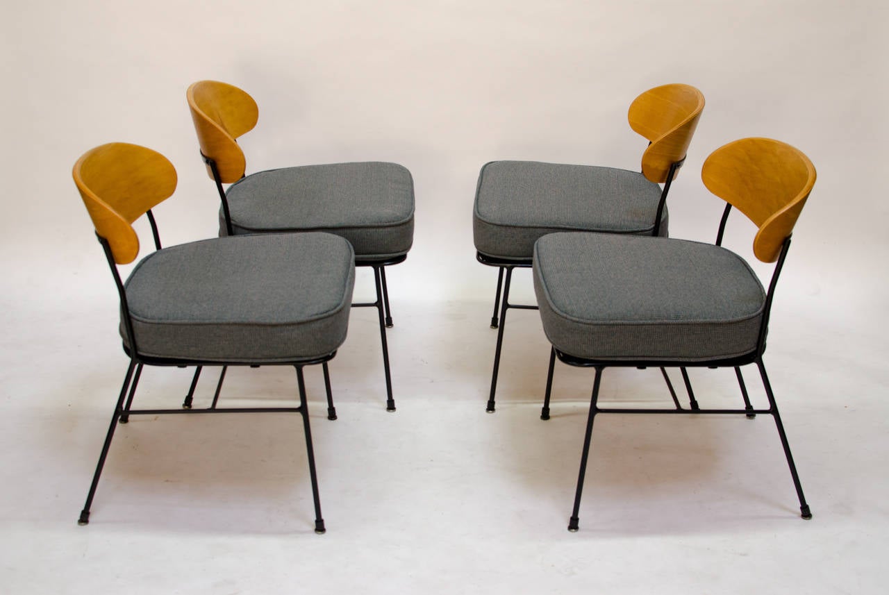 Rare set of loose cushion dining chairs designed by Paul Laszlo for Pacific Iron. This was part of the 