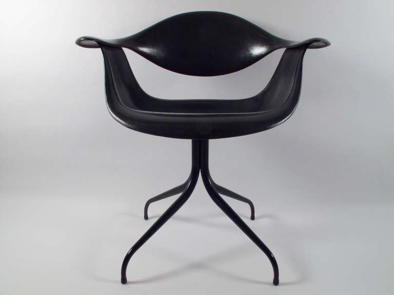 Stunning and rare swag legged side chair designed by George Nelson for Herman Miller. Dark green and grey colored fiberglass on a black swag base. Signed.