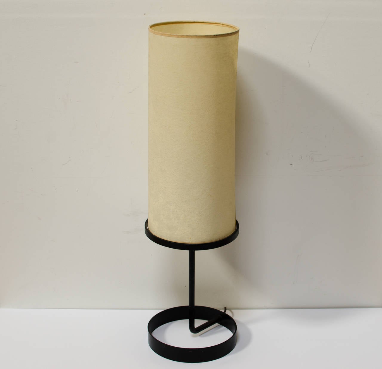 Rare iron table lamp designed by Ben Seibel. Stunning minimalist design.