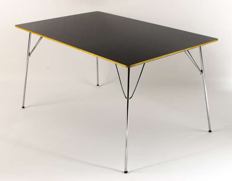 Stunning dining table/desk designed by Charles & Ray Eames for Herman Miller. Very versatile table, can easily be folded up and stored away.