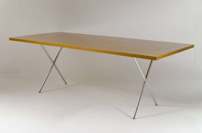 Amazing and rare x-leg dining table designed by Irving Harper and George Nelson for Herman Miller circa1950. Beautiful combed oak surface with a brushed chrome base. This is the biggest of the three sizes made.