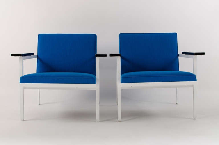 Rare pair of stunning lounge chairs designed by George Nelson for Herman Miller. Freshly recovered in vintage teal-colored Alexander Girard hopsack fabric. Clean lines and extremely well built.