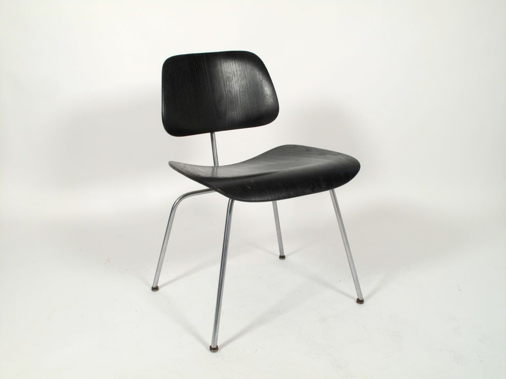 Early transitional DCM's designed by Charles Eames for Evans/Herman Miller circa 1950's. Price is for each chair, 8 available. These have not been refinished and show age appropriate wear. All 8 chairs have been well cared for.