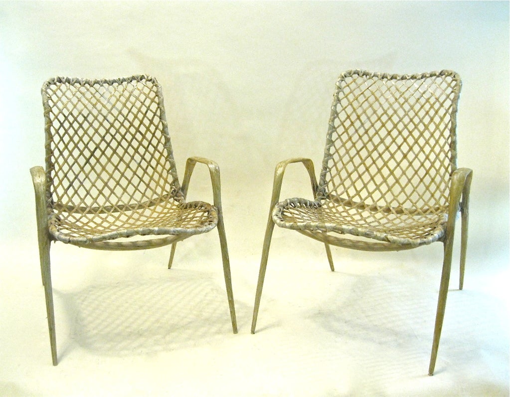 Pair of chairs made of woven fiberglass, ideal for outdoor.