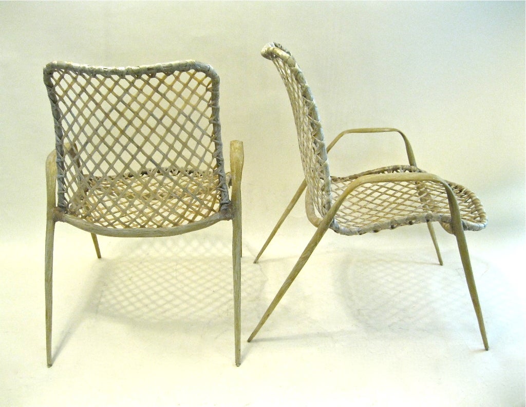 20th Century After Harold M. Schwartz, pair of fiberglass chairs.