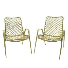 After Harold M. Schwartz, pair of fiberglass chairs.
