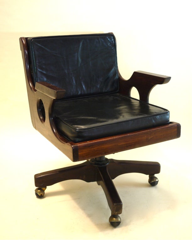 Desk chair with wheels, the piece is in its original state. Design by Don Shoemaker.