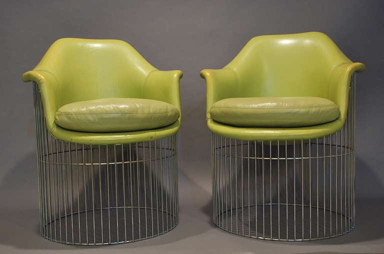 Pair of Armchairs 1970's in green leather and rods base

Good quality finish

Charles Eames seats type