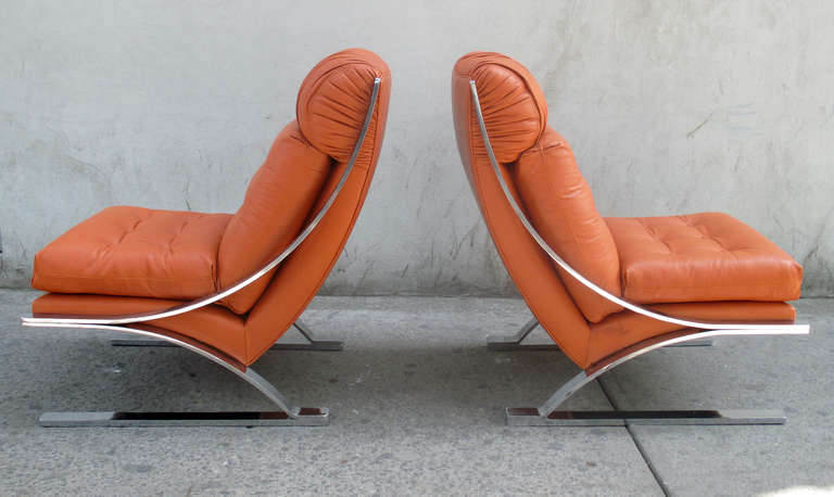 Orange leather and chromed metal lounge chairs, recently restored

Rare to see by Strassle International early 1970`s