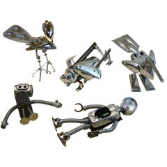Set of scrap robots made of electric chrome Vintage parts
