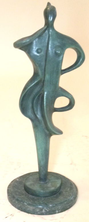 Sculpture in bronze (Measures including base)<br />
Female figure<br />
Signed piece very unique published<br />
Difficult to find book