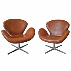 Arne Jacobsen for Fritz Hansen Pair of Leather Swan Chairs