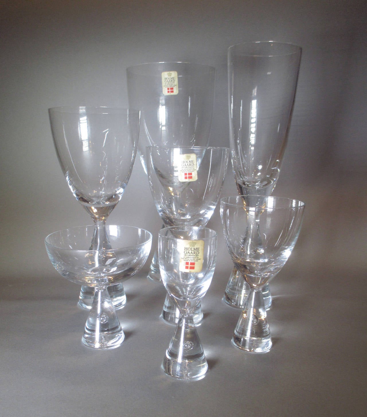 A set of 24 glasses from Denmark's glasshouse Holmegaard. This is the 