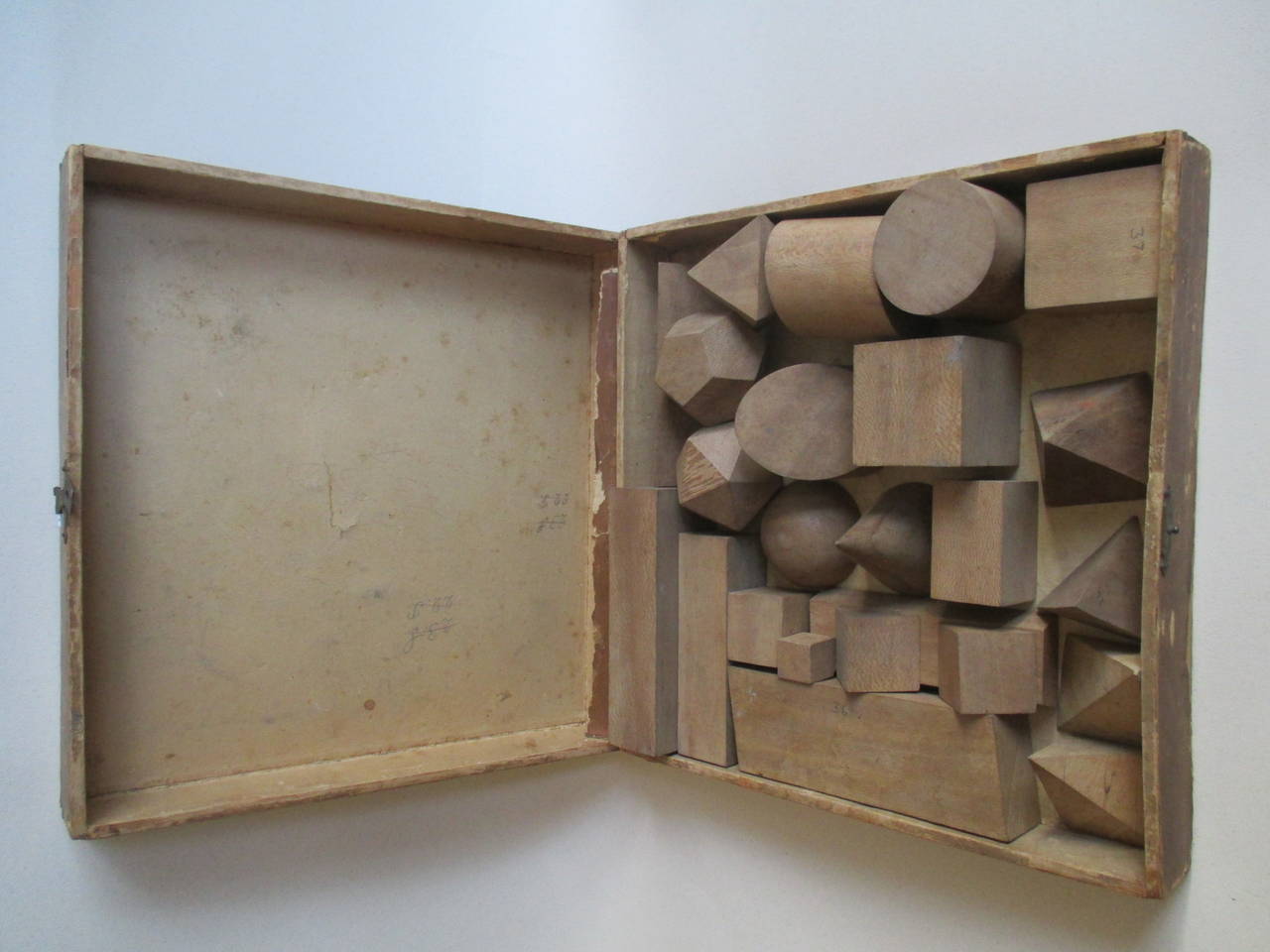 Complete box set with 23 geometric wood shapes by Faustino Palluzie.