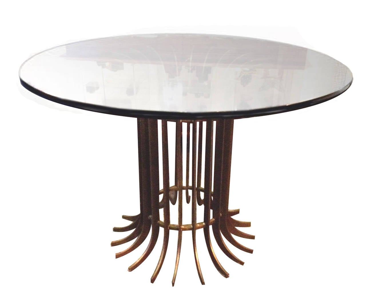 Arturo Pani bronze dining table with glass top.