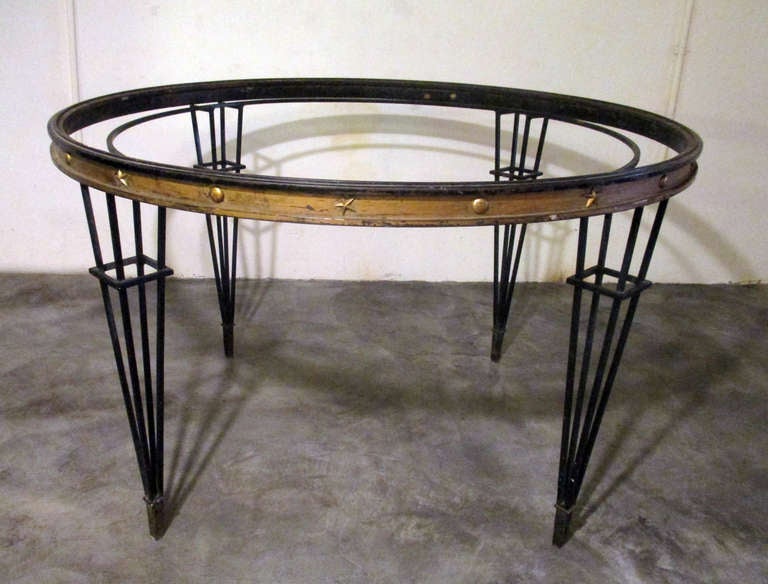 Arturo Pani dining table with eglomise glass, made of iron and bronce, it can also looks good with clear glass
