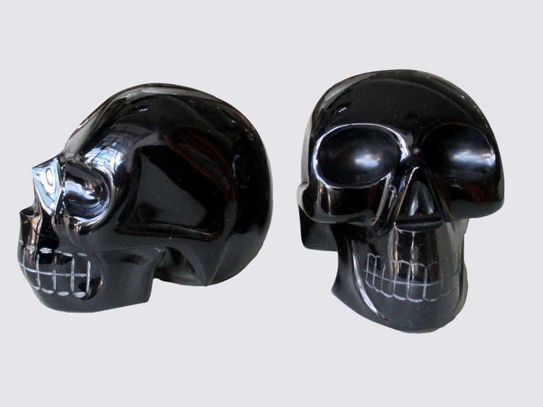 Mid-20th Century Pair Of Skull Bookends Made of Carved Obsidian