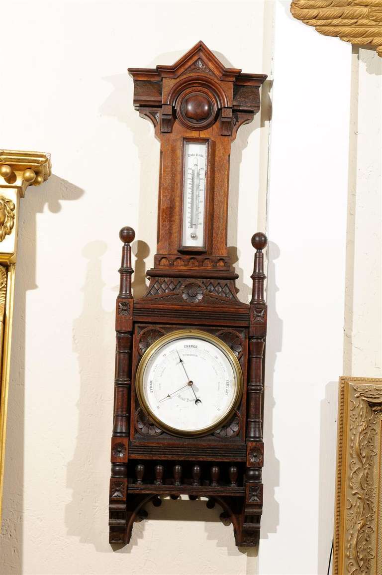 Late 19th/ Early 20th Century German Black Forest Veranderlich Barometer of hand carved and turned wood.