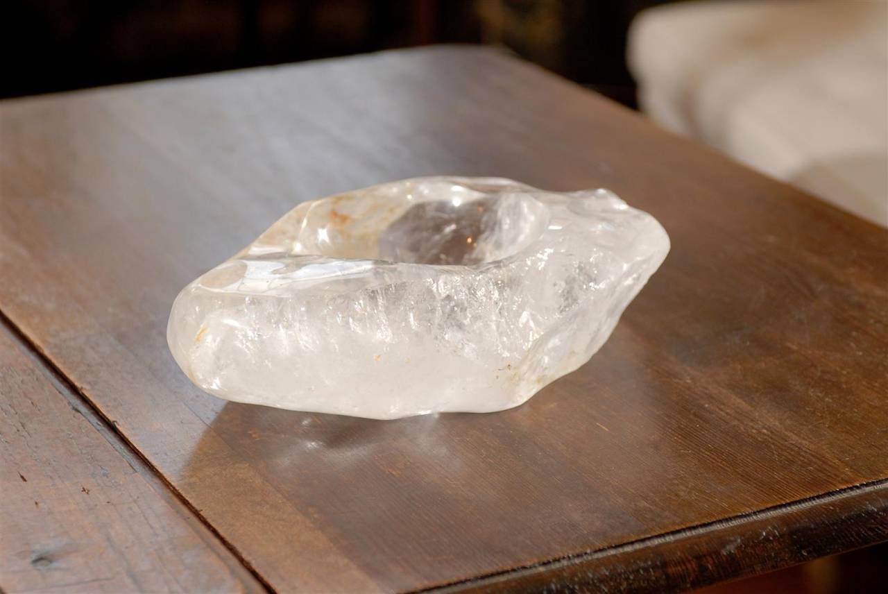Natural rock crystal quartz block with a centre cut bowl to be used as an ashtray or candy dish. Inset bowl measures 5