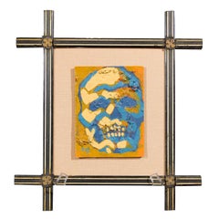 Quadro con teschio e ossa incrociate