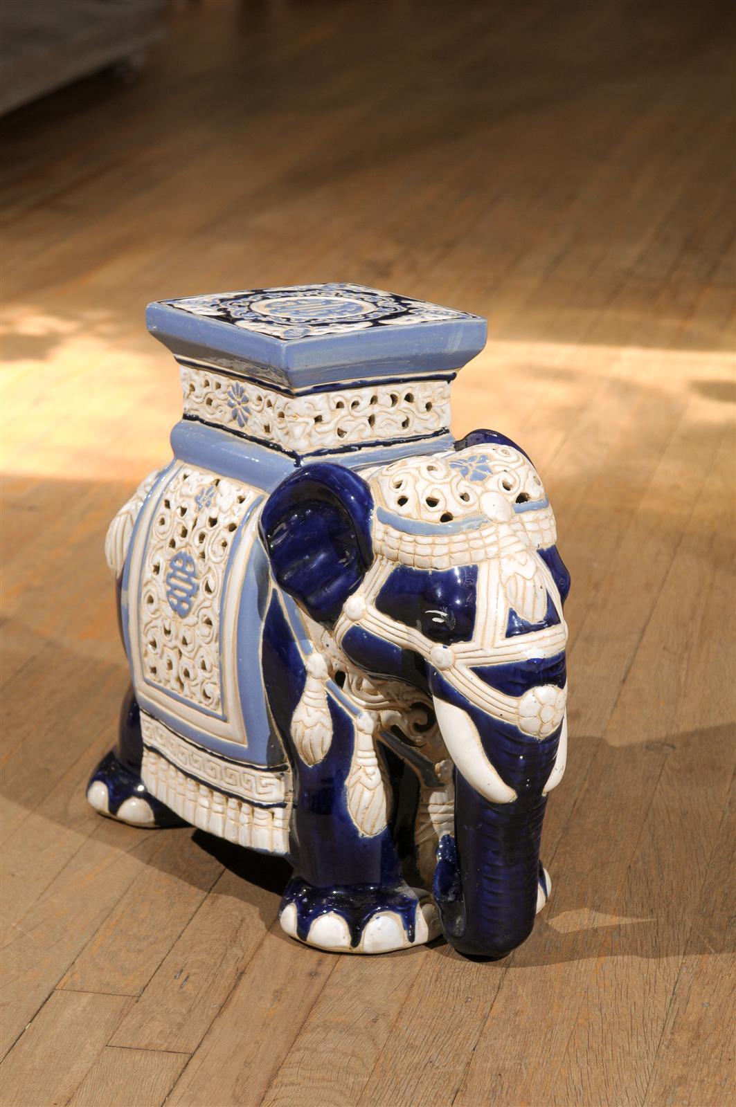 Midcentury pierced ceramic elephant garden stool in hues of blues and cream.