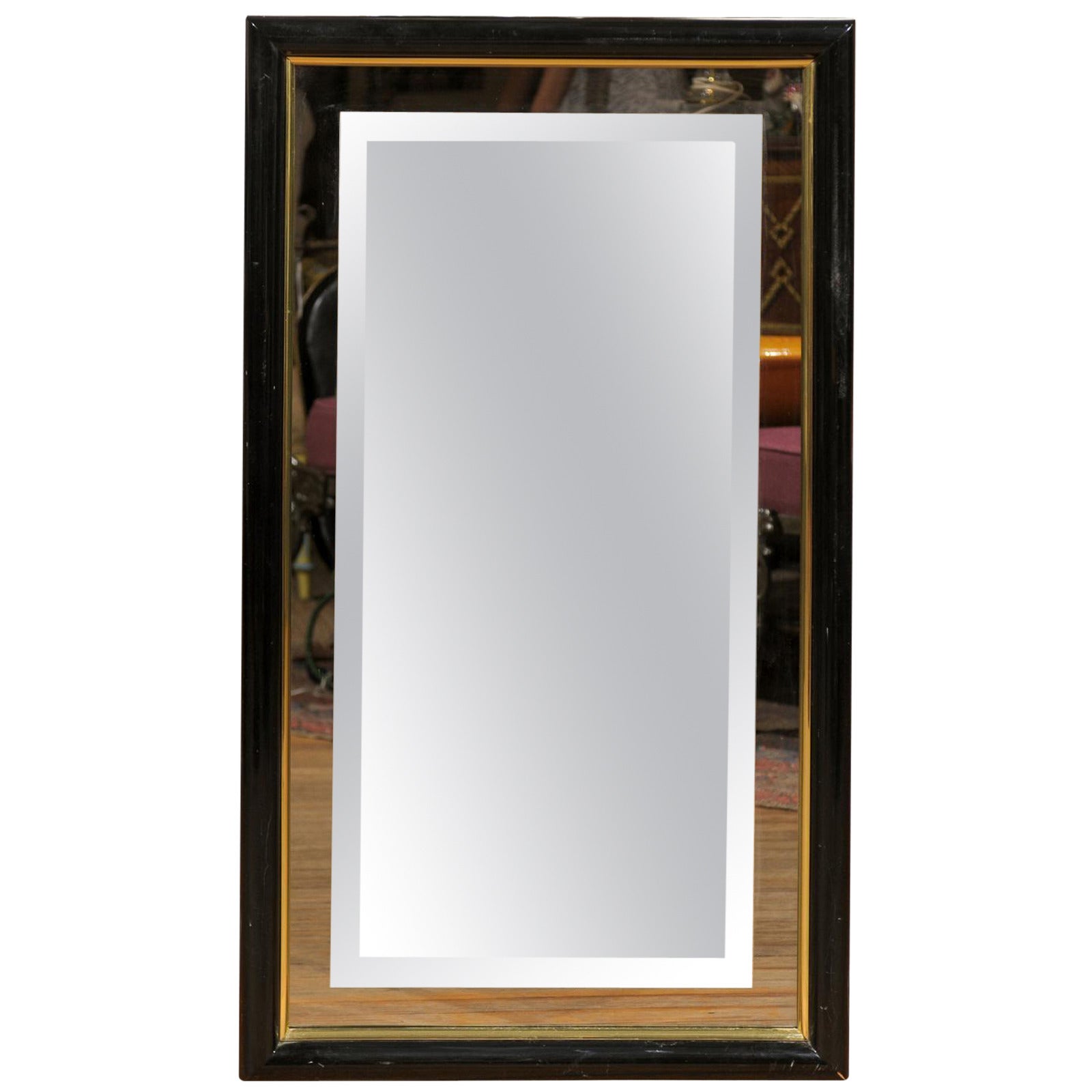 Smoked and Beveled Glass Wall Mirror in a Black and Brass Frame