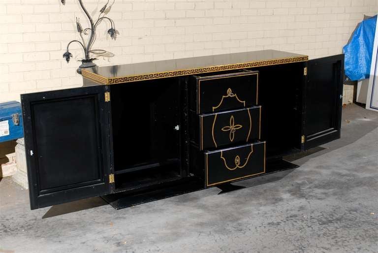 Mid-20th Century Hollywood Regency Black Lacquer and Gilt Credenza
