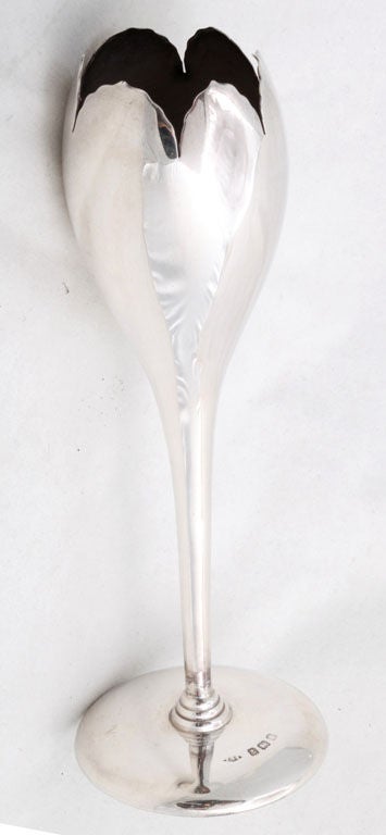 Unusual, sterling silver, flower-form vase, Birmingham, England, 1908, Griffiths & Singleton - makers. 7" high x 2 1/2 diameter across base x 1 1/2" diameter across opening. Weighted base. Excellent condition.