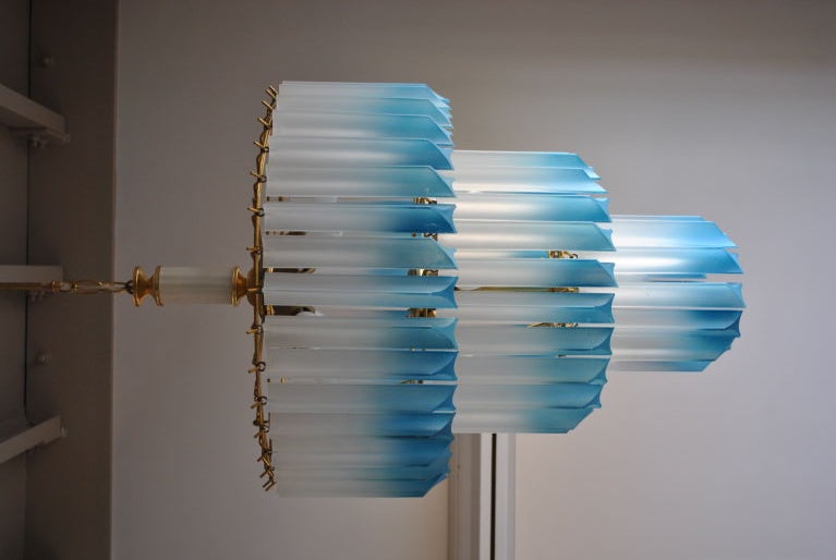 Mid-Century 3-Tier 11-Light Chandelier in the Venini Manner with Frosted Lucite Prisms Shaded to Robinâ??s Egg Blue. This Murano chandelier consists of three concentric rings of acrylic prisms suspended from a 3-tier brass frame. There are three