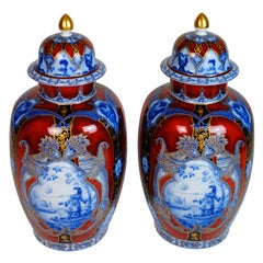 Pair of German Lidded Porcelain Urns in the Oriental Style